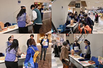 イベントの様子です。職員が府民にアンケートへの回答を促している様子。