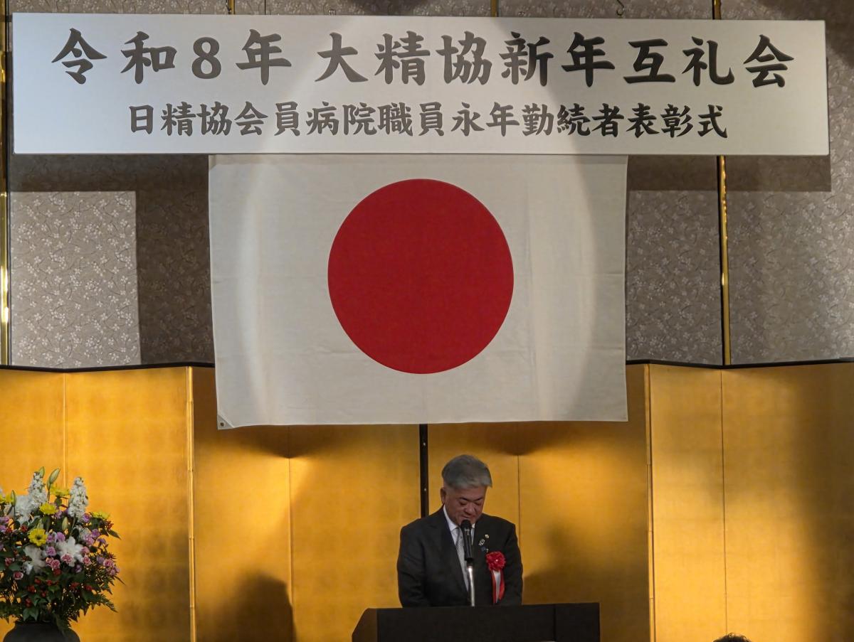 挨拶する金城議長